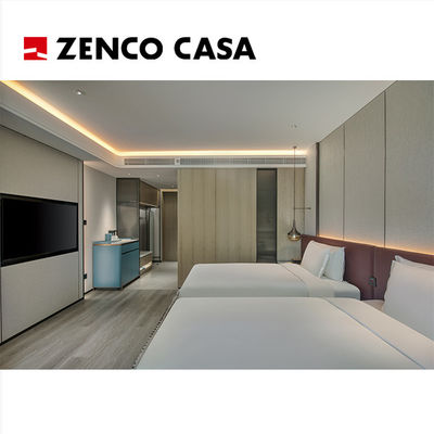 Ensemble de meubles pour chambre jumelle d'hôtel comprend lit et canapé avec coussins